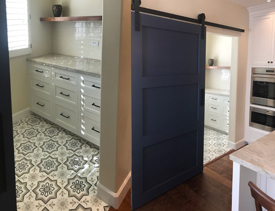 Laundry with cement tile floor 